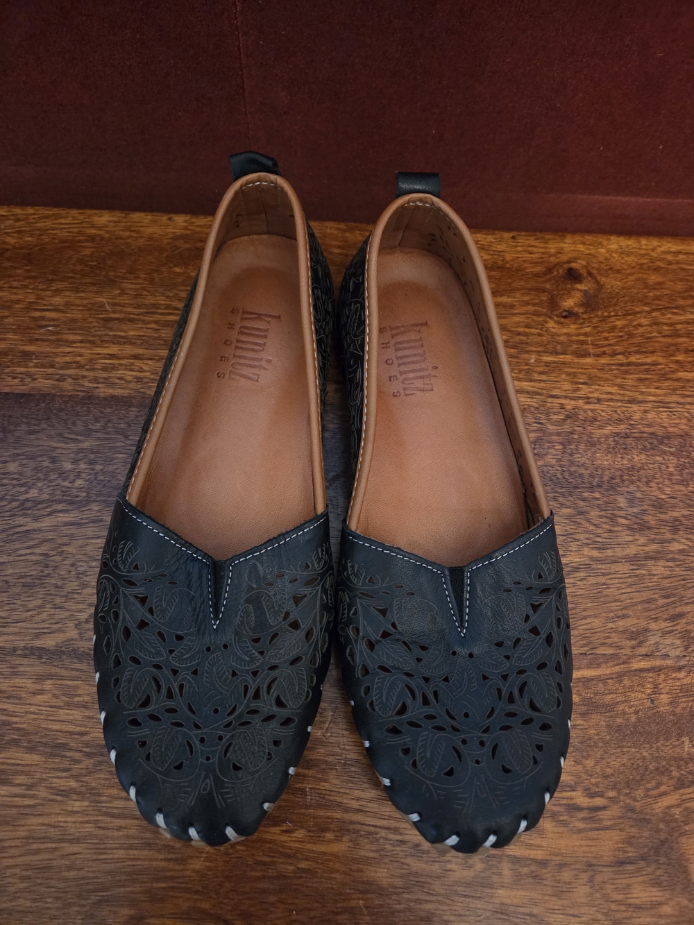 Laser-Cut Black Leather Slip-On Flats by